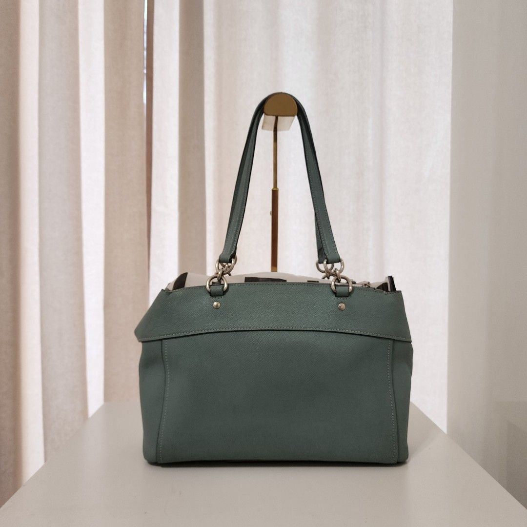 Coach Brooke Carry-all (Category: Luxury Bags & Wallets) located in Quezon City. Submitted by urbangypsy (Listing ID 1436178465, Image 2). Description: - Coach Brooke Carry-all bag - Beautiful teal color - Made with high-quality leather - Spacious interior - Stylish and practical design.