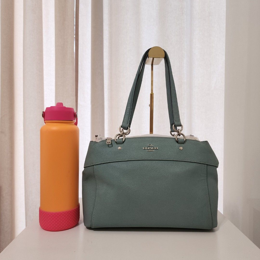Coach Brooke Carry-all (Category: Luxury Bags & Wallets) located in Quezon City. Submitted by urbangypsy (Listing ID 1436178465, Image 3). Description: - Coach Brooke Carry-all bag - Beautiful teal color - Made with high-quality leather - Spacious interior - Stylish and practical design.