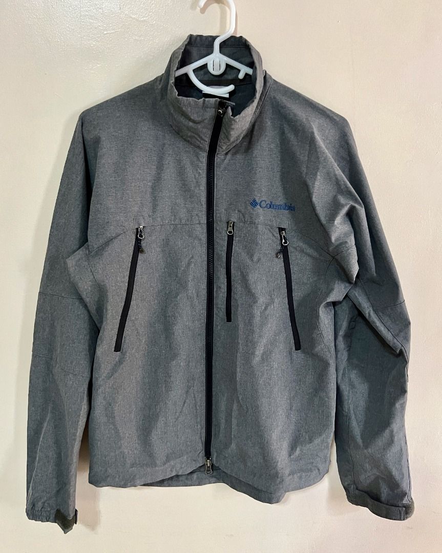 COLUMBIA Sportswear Jacket - Gray (Category: Coats, Jackets and Outerwear) located in Taguig. Submitted by LessThan (Listing ID 1436240166, Image 1). Description: Columbia Sportswear jacket Color: Gray Size: Body (19" x 26" inches), Sleeves (30" x 5"-8" inches) - Full zip closure - Multiple zippered pockets - Columbia logo on chest - Stand-up collar - Durable, weather-resistant material.