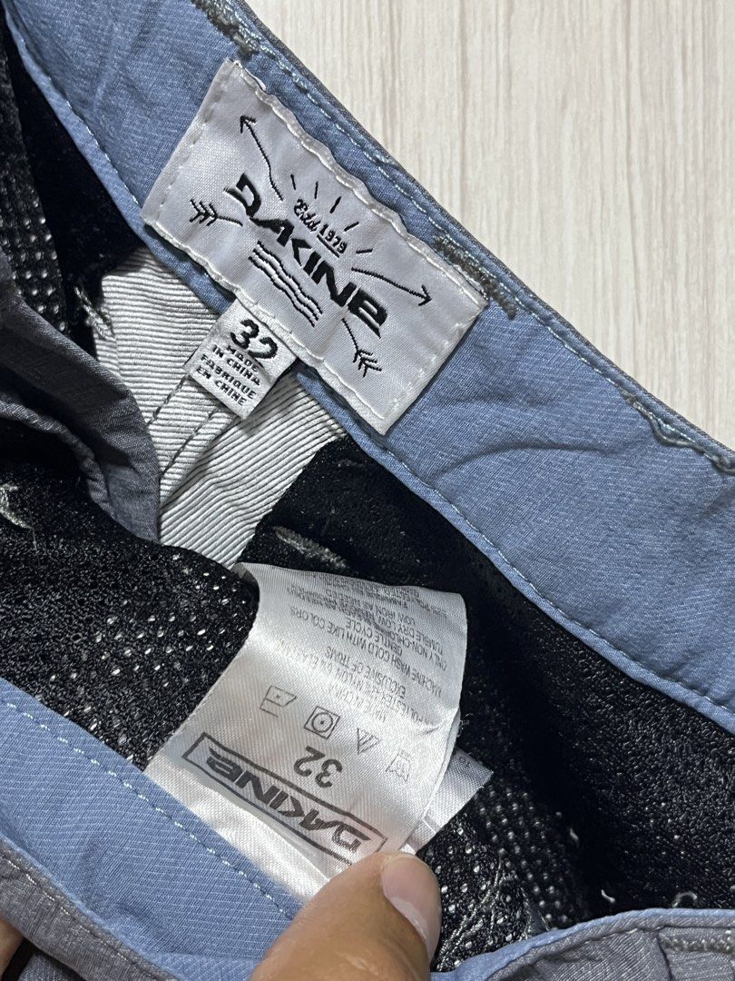 Dakine Gray Shorts Size 32 (Category: Shorts) located in Bulacan. Submitted by sef19 (Listing ID 1436208453, Image 2). Description: - Dakine Gray Shorts - Size: 32 - Features: Button closure, multiple pockets - Material: Lightweight, textured fabric - Suitable for: Casual wear - Details: Dakine logo on back pocket, Made in China.