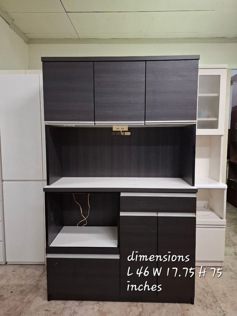 Dark Wood Cabinet with Drawers (Category: Shelves, Cabinets & Racks) located in Quezon City. Submitted by japandemanila (Listing ID 1436110539, Image 1). Description: - Stylish dark wood cabinet - White countertop - Multiple drawers and cabinet doors - Interior shelves - Ample storage space - Modern design - Suitable for various rooms JAPAN SURPLUS *6 Magdiwang st. Philvirra Homes Quezon City *in good condition with minimal scratch *pick up or de