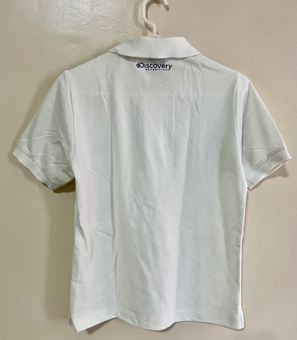 DISCOVERY EXPEDITION Polo Shirt White (Category: Tshirts & Polo Shirts ) located in Taguig. Submitted by LessThan (Listing ID 1436229613, Image 2). Description: Discovery Expedition polo shirt Plain White Size: Body (18" x 23" inches), Sleeves (8" x 5"-8" inches) - Features Discovery Expedition logo - Collared neckline - Short sleeves - Comfortable fabric - Perfect for casual wear.