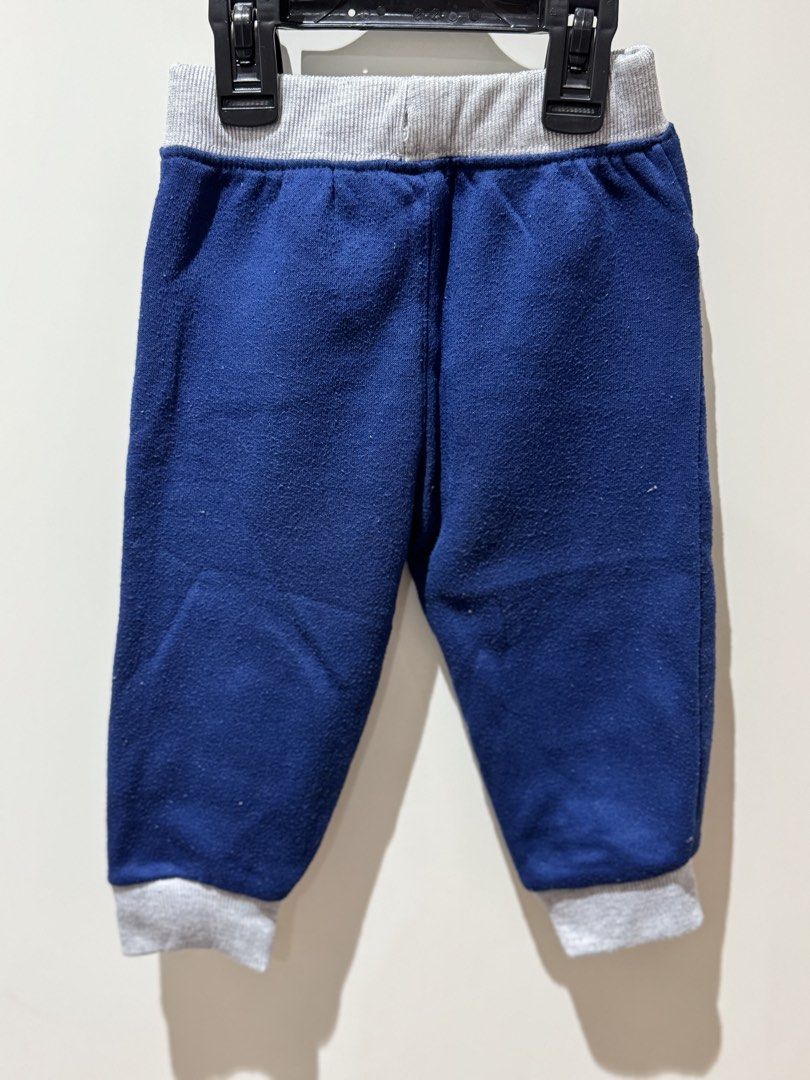 Disney Baby Mickey Mouse Pants 18M (Category: Babies & Kids Fashion) located in Quezon City. Submitted by joyeusefille (Listing ID 1436275385, Image 2). Description: - Disney Baby Mickey Mouse pants - Navy blue with gray waistband and cuffs - Features a red drawstring and two front pockets - Size: 18 months - Made in Egypt.