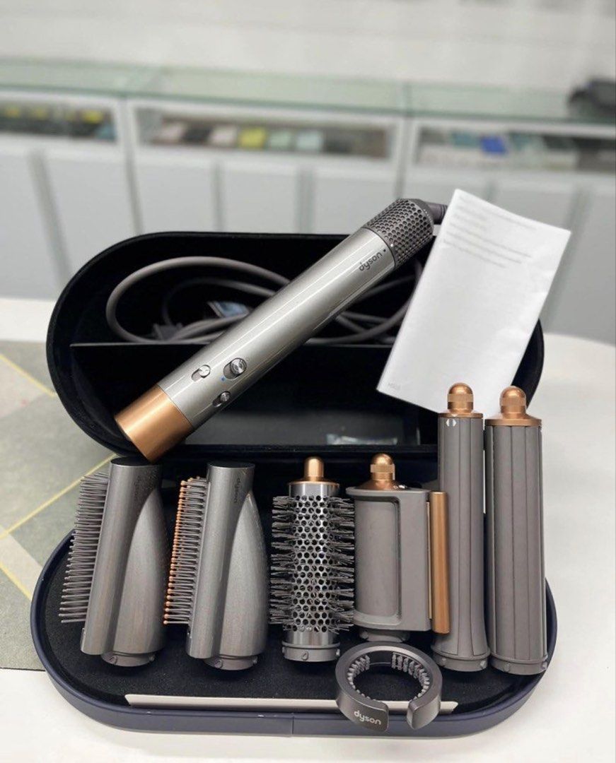 Dyson Airwrap Multi Styler (Category: Hair) located in Reina Mercedes. Submitted by bhea1110 (Listing ID 1436163057, Image 1). Description: - Dyson Airwrap Complete Styler - Silver and copper color scheme - Includes all original attachments - Comes with storage case - Features barrels and brushes for curling, smoothing, and volumizing -please dm me directly 09999909724.