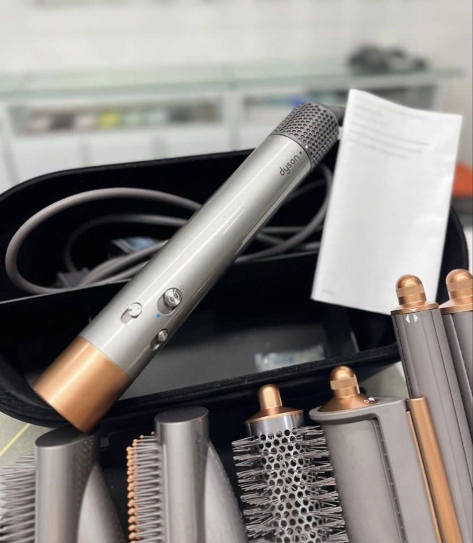 Dyson Airwrap Multi Styler (Category: Hair) located in Reina Mercedes. Submitted by bhea1110 (Listing ID 1436163057, Image 3). Description: - Dyson Airwrap Complete Styler - Silver and copper color scheme - Includes all original attachments - Comes with storage case - Features barrels and brushes for curling, smoothing, and volumizing -please dm me directly 09999909724.