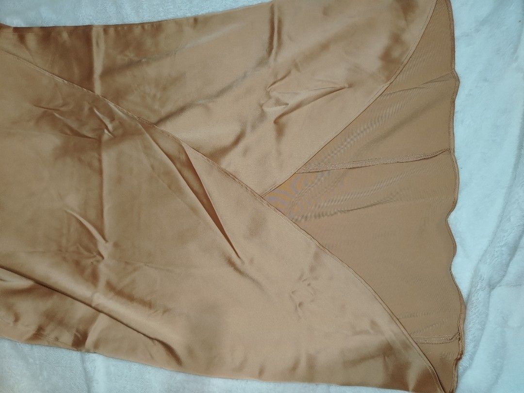 Elegant Satin Dress (Category: Dresses) located in Binangonan. Submitted by happymoon_ef9b52 (Listing ID 1436153680, Image 3). Description: - Bronze satin dress - Floor-length skirt - V-neckline - Wrap-style design - Sleeveless - Gathered shoulder detail - Perfect for formal events.