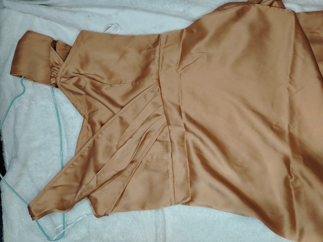 Elegant Satin Dress (Category: Dresses) located in Binangonan. Submitted by happymoon_ef9b52 (Listing ID 1436153680, Image 2). Description: - Bronze satin dress - Floor-length skirt - V-neckline - Wrap-style design - Sleeveless - Gathered shoulder detail - Perfect for formal events.