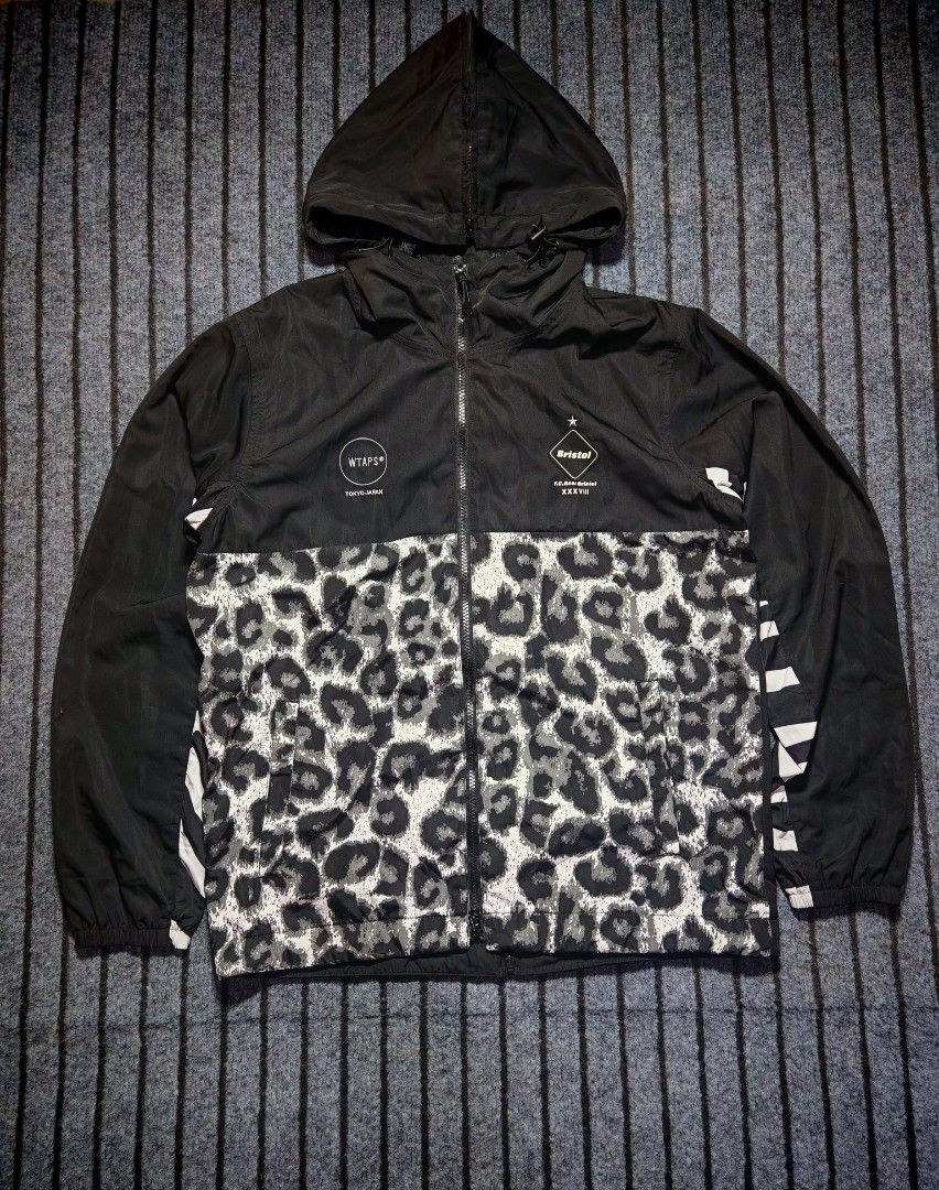 F.C. Real Bristol x Fragment Design x Wtaps (Category: Coats, Jackets and Outerwear) located in Camalig. Submitted by 50thrifty (Listing ID 1436235692, Image 2). Description: Size: Medium on tag 22x27 This item is the WTAPS x F.C.Real Bristol (F.C.R.B.) Leopard Practice Jacket from their Fall/Winter 2017 collaboration, which officially released on January 2, 2018. This capsule collection merged F.C.R.B.’s football-inspired "Separate Practice Jack