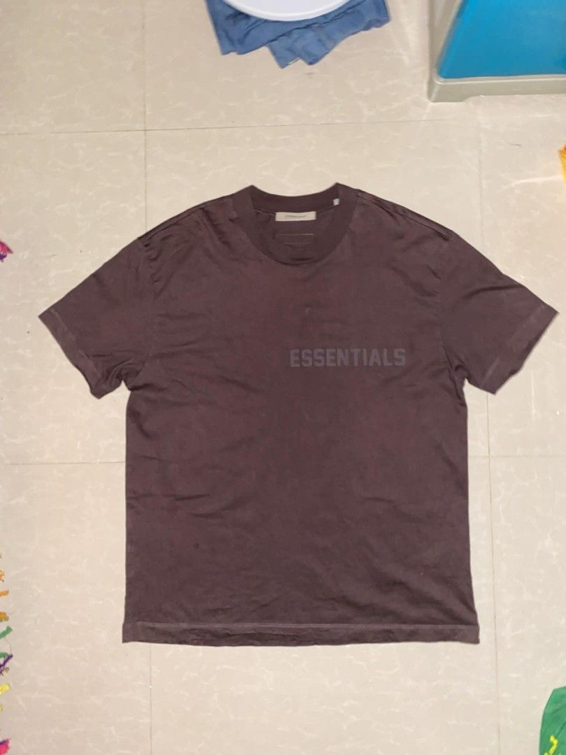 Fear of God Essentials T-shirt (Category: Tshirts & Polo Shirts ) located in Caloocan City. Submitted by roro9822 (Listing ID 1436182078, Image 1). Description: - Fear of God Essentials T-shirt - Size: M (W-25 L-32) - Color: Dark Brown - Material: 100% Cotton - Features the Essentials logo - Made in Vietnam.