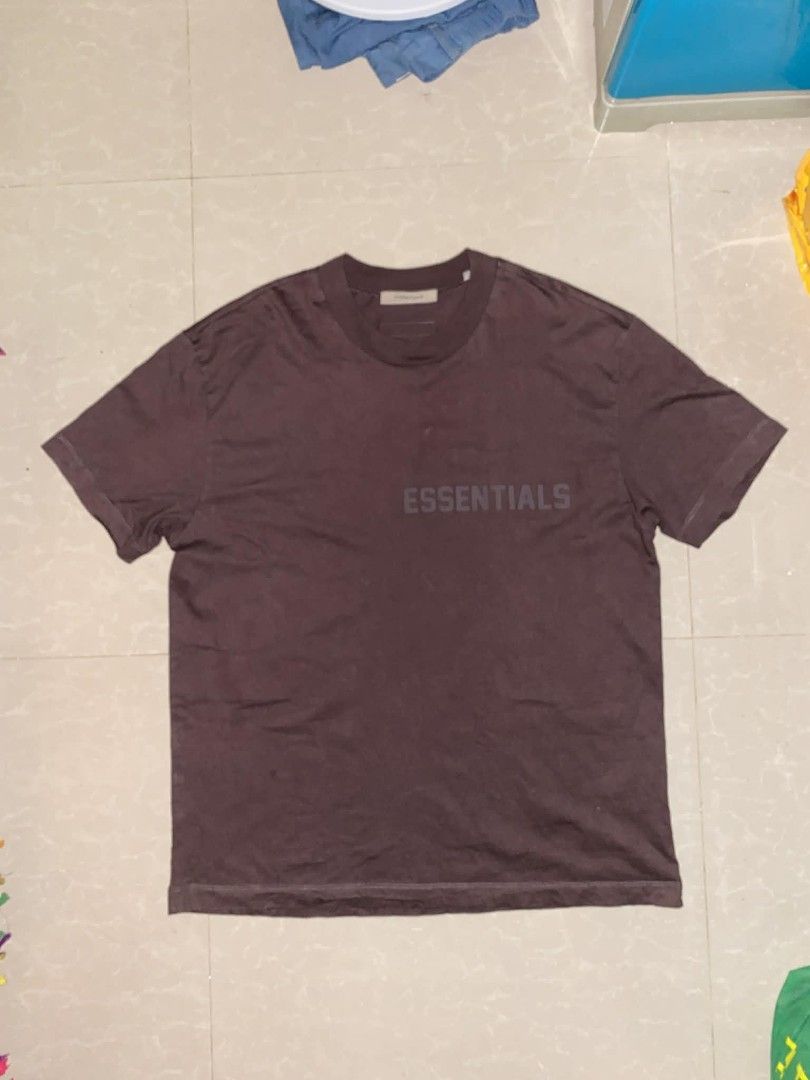Fear of God Essentials T-shirt (Category: Tshirts & Polo Shirts ) located in Caloocan City. Submitted by roro9822 (Listing ID 1436182078, Image 2). Description: - Fear of God Essentials T-shirt - Size: M (W-25 L-32) - Color: Dark Brown - Material: 100% Cotton - Features the Essentials logo - Made in Vietnam.