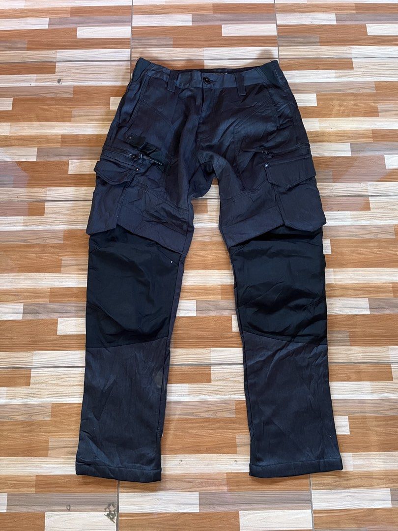 Fieldcore x Cordura Tactical Pants (Category: Jeans) located in Nabua. Submitted by lastthrift2.0 (Listing ID 1436278375, Image 2). Description: Dimes•32x39 Excellent condition - Black Cordura cargo pants - Size: L - Durable and built to last - Multiple pockets for storage - Reinforced panels for added strength - Unique design with mixed fabric panels - Button and zipper closure.