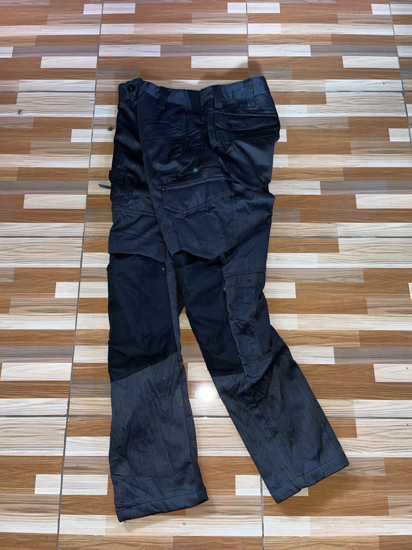 Fieldcore x Cordura Tactical Pants (Category: Jeans) located in Nabua. Submitted by lastthrift2.0 (Listing ID 1436278375, Image 1). Description: Dimes•32x39 Excellent condition - Black Cordura cargo pants - Size: L - Durable and built to last - Multiple pockets for storage - Reinforced panels for added strength - Unique design with mixed fabric panels - Button and zipper closure.