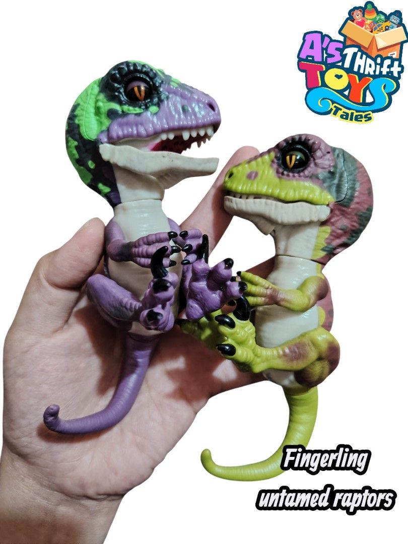 Fingerling Untamed Raptors (Category: Figurines & Statues) located in Iligan City. Submitted by shehabdor98515 (Listing ID 1436281475, Image 1). Description: - Fingerling Untamed Raptors available! - Vibrant colors and detailed designs. - Interactive and poseable toys. - Perfect for dinosaur lovers and collectors. - Bring these raptors to life! -purple w/ issue (not working on and off) - green no issue.
