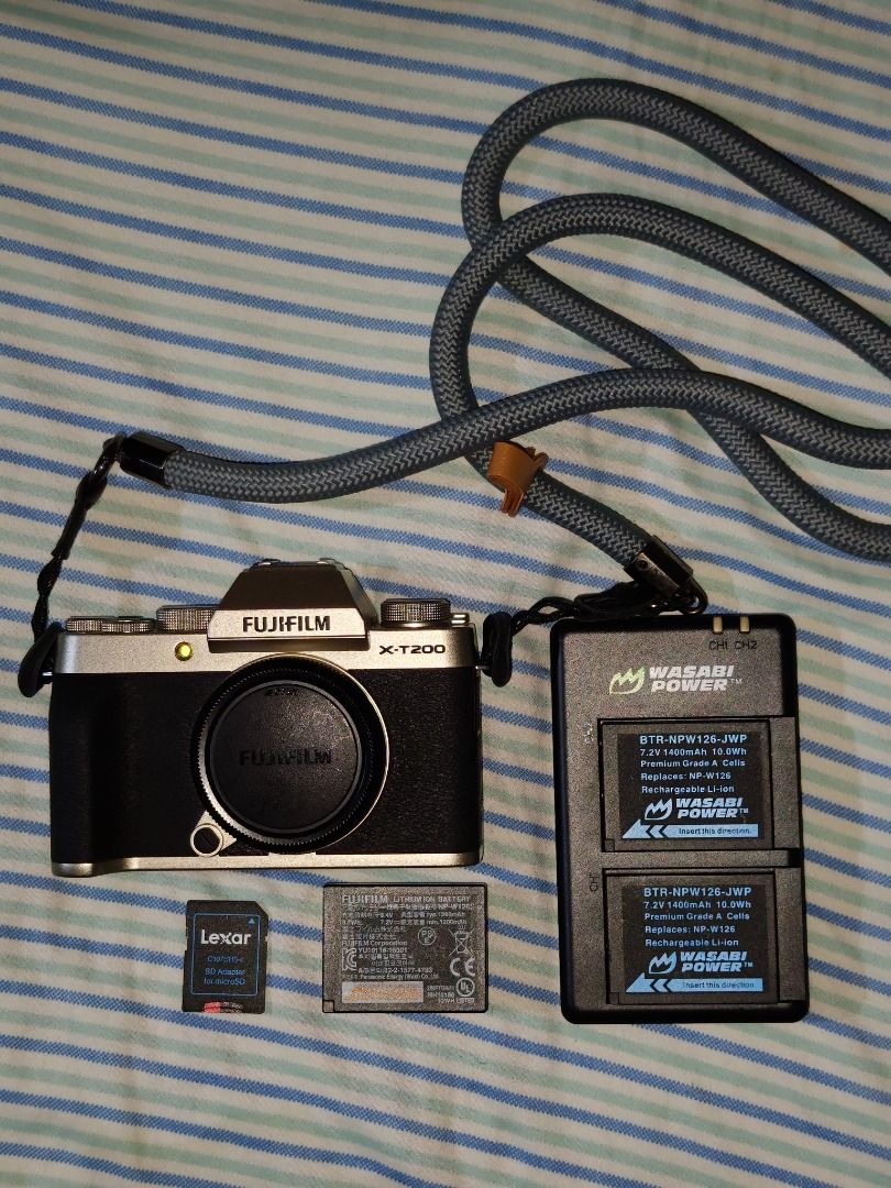 Fujifilm X-T200 Body & Accessories (Category: Camera Bags & Carriers) located in Quezon City. Submitted by wangsi.fam (Listing ID 1436274970, Image 1). Description: Selling my Fujifilm X-T200 body & accessories - Camera body - Box and manuals - 3 batteries & charger - Neck strap - Memory card.