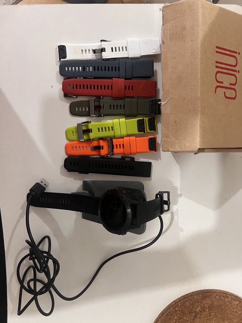 Garmin Fenix 5X Smartwatch with Extra Straps (Category: Wearables & Smart Watches) located in Quezon City. Submitted by meshtie (Listing ID 1436107490, Image 2). Description: - Garmin Fenix 5X smartwatch - Includes: - Multiple colored straps (white, blue, red, green, orange) - Charging cable - Charging dock - Displays time and date - Black watch Makunat battery! Sobra! From Us di na nagagamit Rfs. Will upgrade! Still nego for sure buyers! .