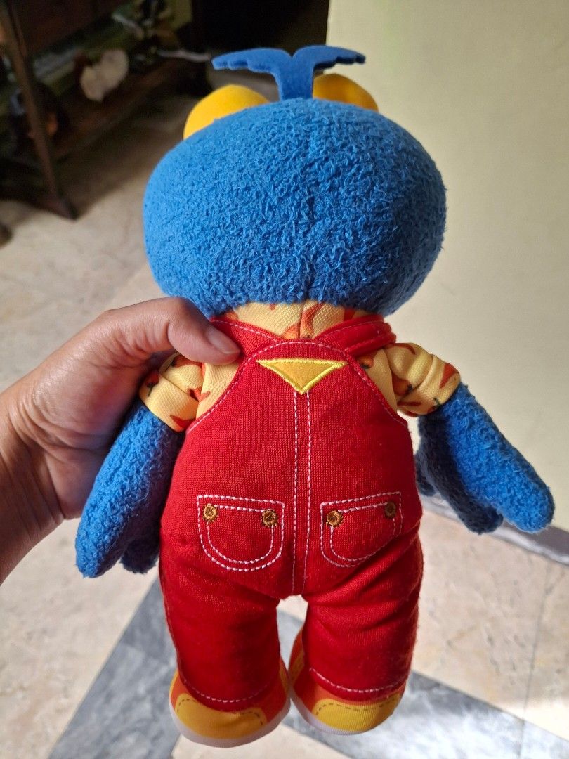 Gonzo the Great Muppets Plush Toy (Category: Plushies & Soft Toys) located in Quezon City. Submitted by pure_trinsky (Listing ID 1436111116, Image 2). Description: - Gonzo the Great plush toy - Features: - Blue fur - Large beak - Red overalls with 'D' on pocket - Yellow and orange patterned sleeves and shoes - Well-made with detailed stitching - Rare - Original Disney on tag.