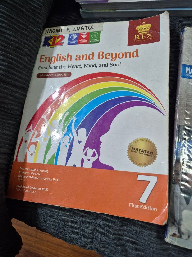 Grade 7 Textbook (Category: Textbooks) located in Mandaluyong City. Submitted by gnemtaz (Listing ID 1436151969, Image 1). Description: English and Beyond textbook for Grade 7. First Edition. Published by Rex Bookstore. Includes enriching content for the heart, mind, and soul. Features the MATATAG seal. Perfect for students..