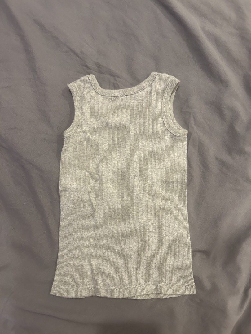 grey basic racerback tank top (Category: Sleeveless) located in Paranaque City. Submitted by bruised_soup (Listing ID 1436215623, Image 2). Description: says small on tag rfs: decluttering mop: gcash / bank transfer mod: jnt / lalamove tags: capsule wardrobe, neutral colors, chic, essential, classy, elegant, pinterest, aesthetic.