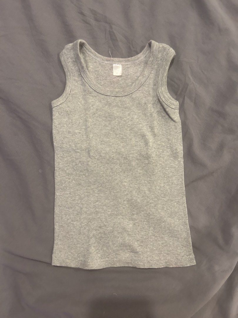 grey basic racerback tank top (Category: Sleeveless) located in Paranaque City. Submitted by bruised_soup (Listing ID 1436215623, Image 1). Description: says small on tag rfs: decluttering mop: gcash / bank transfer mod: jnt / lalamove tags: capsule wardrobe, neutral colors, chic, essential, classy, elegant, pinterest, aesthetic.