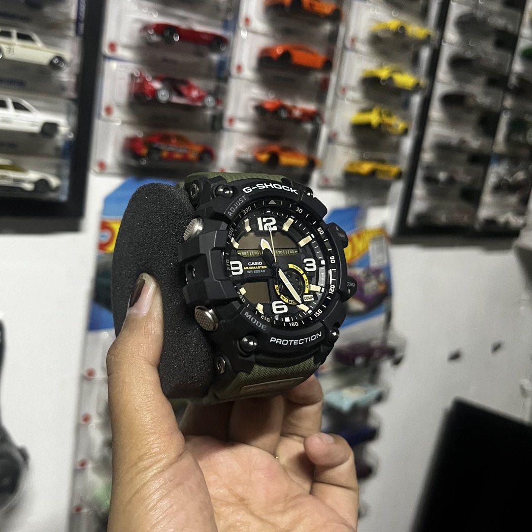 G-Shock Mudmaster Watch (Category: Men's Watches) located in Manila. Submitted by sheilasaurus (Listing ID 1436265411, Image 1). Description: Super kinis pa and once lang nagamit sa kasal. Original price was 26k and that was 3 years ago. Nego just hit me up. RFS: Decluttering (hindi bagay sa display ng mga kotse hahahahhaa) Description below: G-Shock Mudmaster watch features a black and olive green design. It has a digital display with multiple f
