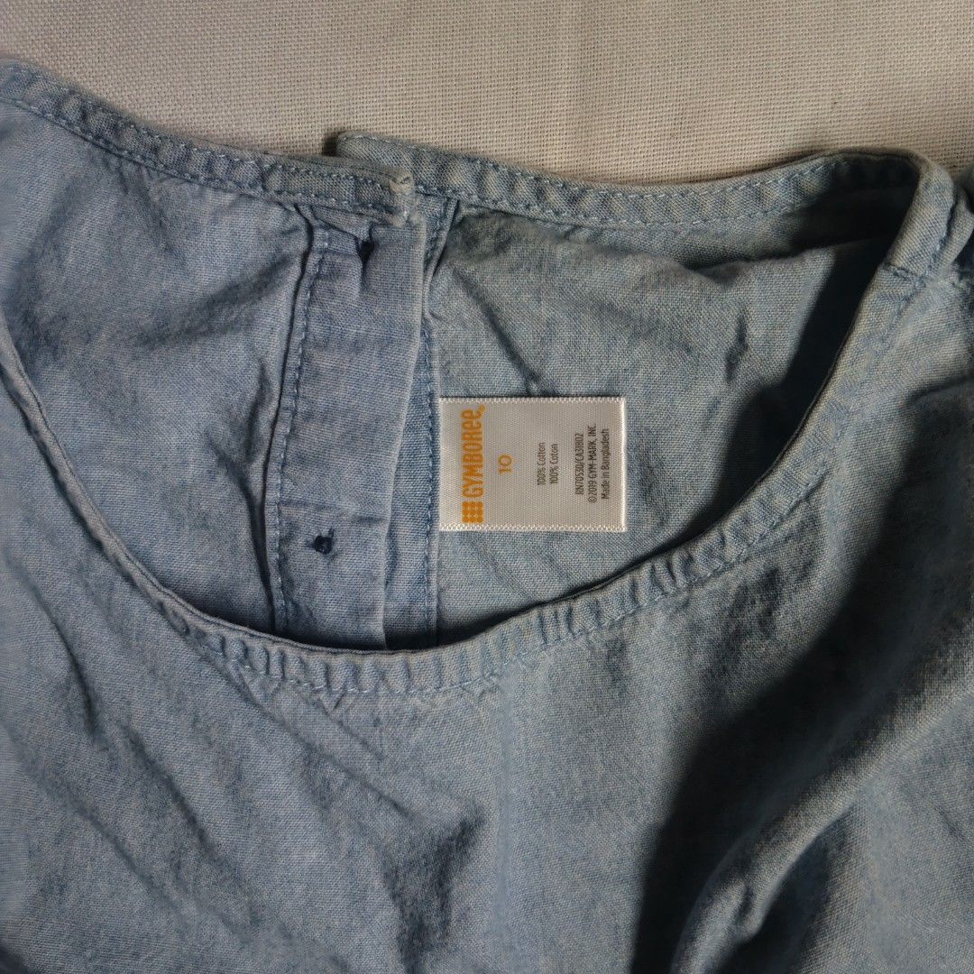 Gymboree Denim Dress - Size 10 (Category: Babies & Kids Fashion) located in Subic. Submitted by gbr6l (Listing ID 1436111619, Image 2). Description: - Gymboree denim dress - Size 10 - Classic denim design - Made of 100% cotton - Features a pocket detail - Made in Bangladesh.