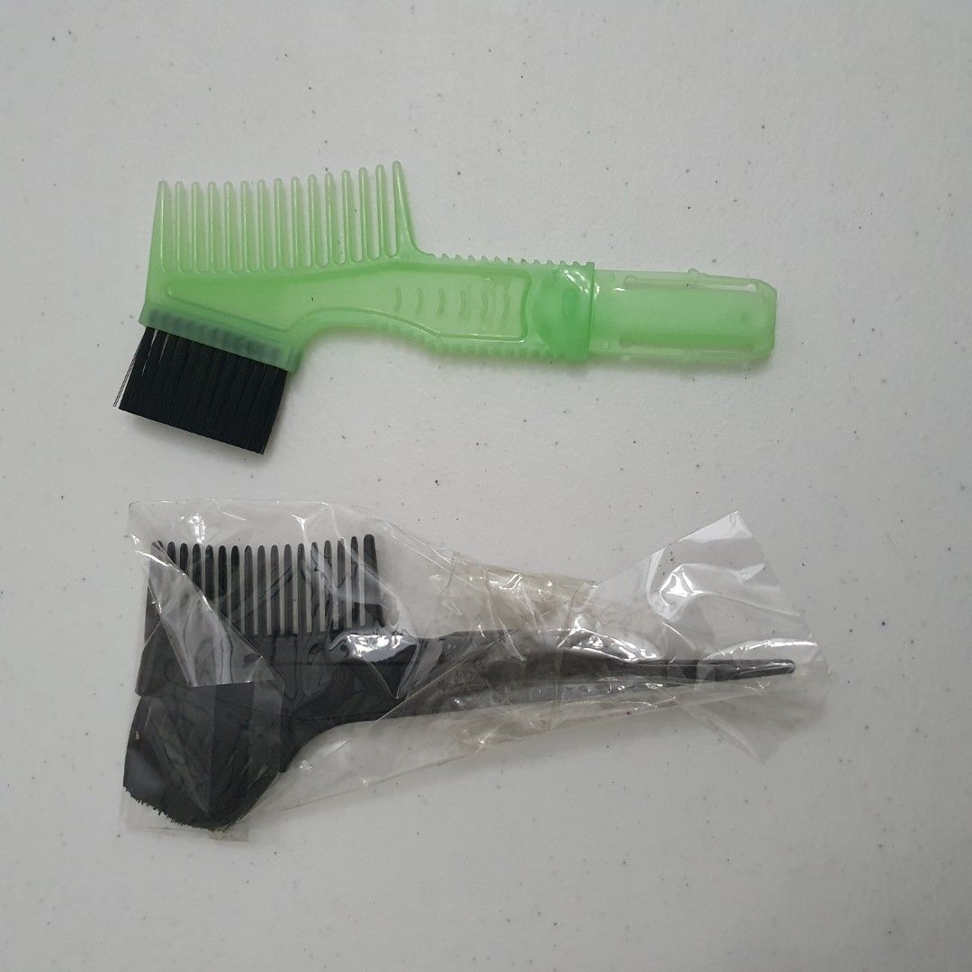 Hair Dye Applicator Brush and Comb Set (Category: Hair) located in Paranaque City. Submitted by cobien (Listing ID 1436286213, Image 2). Description: - Includes two hair dye applicators. - Black applicator: comb, pointed end. - Green applicator: comb, brush, textured handle for grip. - Made of plastic. - Ideal for hair dye and hair treatments..