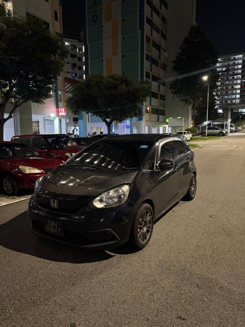 Honda Fit 1.3 LED Honda Sensing (A) (Category: Used Cars) located in Singapore. Submitted by blvckspero (Listing ID 1347098037, Image 2). Description: Category PARF Car Honda Fit 1.3 GF Led sensing 2020 model Type of Vehicle Hatchback Features Responsive 1.3L DOHC I-VTEC engine with 5 speed CVT auto transmission, good fuel consumption. View specs of the Honda Fit Accessories Sports rims(O.Z Racing),New leather seats, upgraded C1 Android System wi