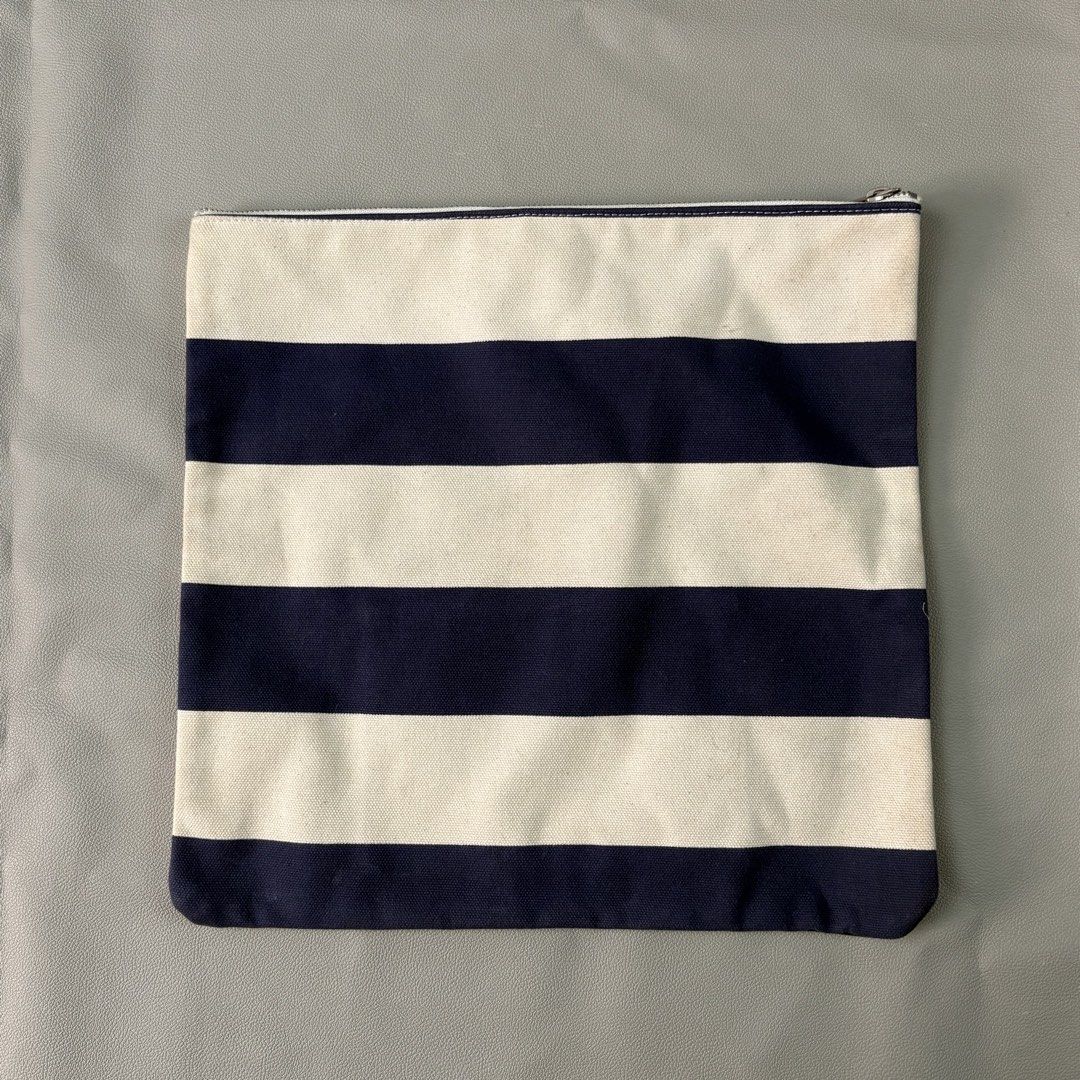Japan porter stripped clutch bag (Category: Belt bags, Clutches and Pouches) located in Quezon City. Submitted by dufflebag_boy (Listing ID 1436117646, Image 2). Description: Japan porter stripped clutch bag -Price: 1,000 -Excellent condition HMU 📩.