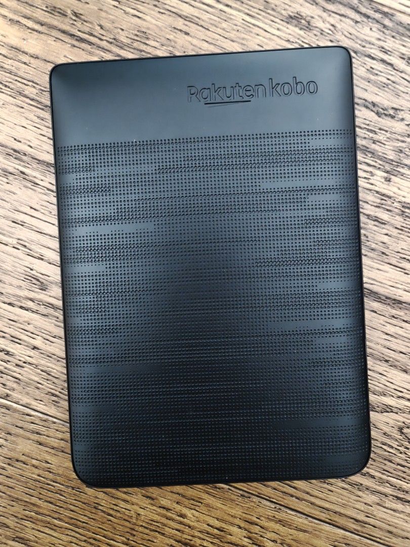 Kobo E-reader (Category: E-Readers) located in Singapore. Submitted by sdyl23163 (Listing ID 1436210397, Image 2). Description: - let it gi for unused Kobo e-reader - Clear screen display - Textured back design - Includes protective cover - Perfect for avid readers!.