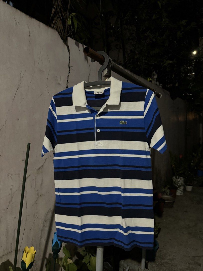 Lacoste polo shirt (Category: Tshirts & Polo Shirts ) located in Quezon City. Submitted by tempestdouble (Listing ID 1436258185, Image 1). Description: -18x26 -slight yellowing sa neckline.