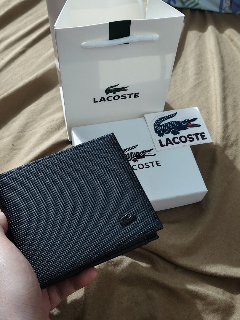 Lacoste wallet with built in coinpurse (Category: Wallets & Card Holders) located in Manila. Submitted by danicacruz1024 (Listing ID 1436264471, Image 1). Description: brandnew original free lacoste sticker paubos sale ulit 🫶.