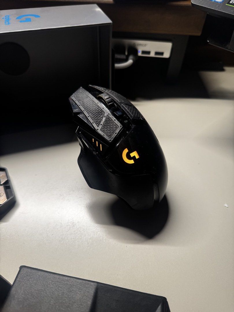 Logitech G502 Wireless Gaming Mouse (Category: Mouse & Mousepads) located in Marilao. Submitted by miguelsanti (Listing ID 1436233056, Image 3). Description: In good physical condition, no defects/issue Box still in good condition with receipt, all accessories (cable, dongle, weights) 3rd party dock and XL desk mousepad included.