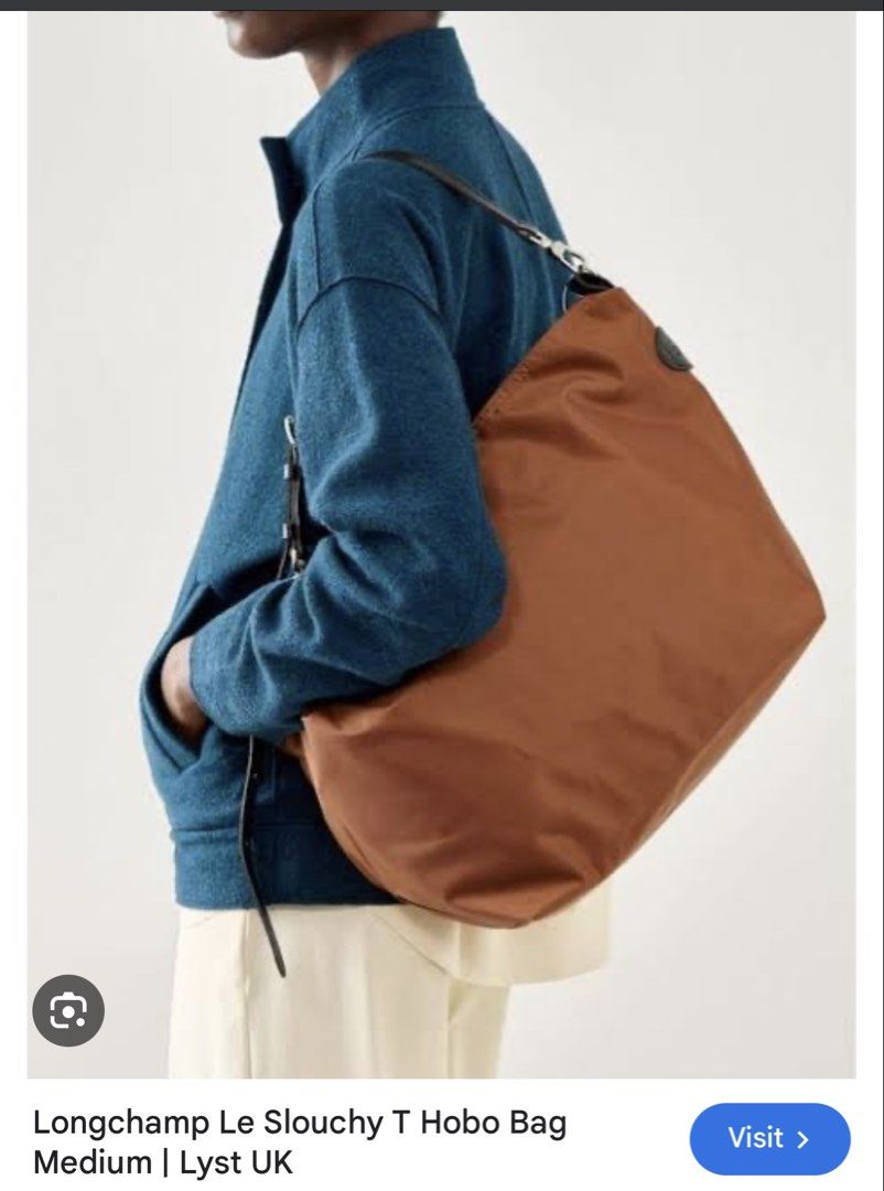 Longchamp Le Slouchy Hobo Bag (Category: Luxury Bags & Wallets) located in Mandaluyong City. Submitted by tidyingupnow (Listing ID 1436203347, Image 3). Description: - Longchamp Le Slouchy Hobo Bag - Cognac nylon exterior - Black leather strap - Medium size - Sleek, modern design - Suitable for everyday use - Versatile style - Zipper closure - Spacious interior.