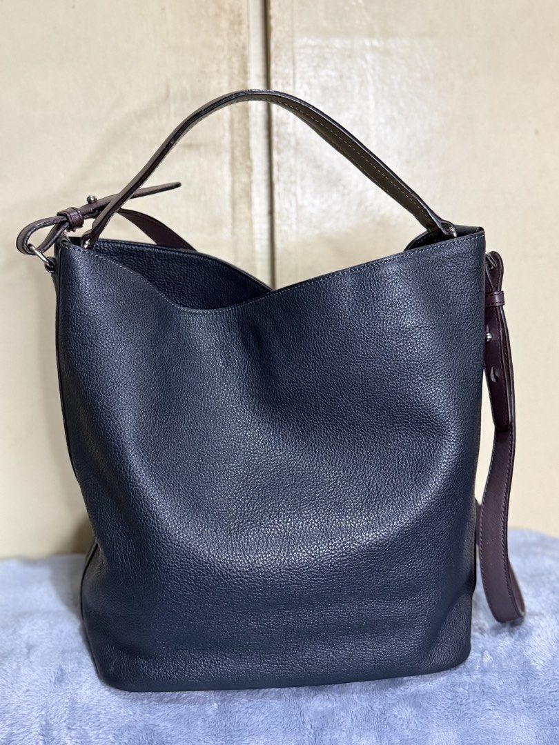 Lo*uis Qua*torze Leather Bucket Bag (Category: Shoulder Bags) located in Caloocan City. Submitted by paterf (Listing ID 1436203572, Image 3). Description: • Combination of dark Bluegreen grained, burgundy & taupe smooth genuine calf leathers with silver hardwares • Made in Korea • Size: M • Measurements: 10” L x 7” W x 11” H • Excellent used condition with very minimal signs of wear & storage • Coded with white tag • Flaws/issues: missing leather