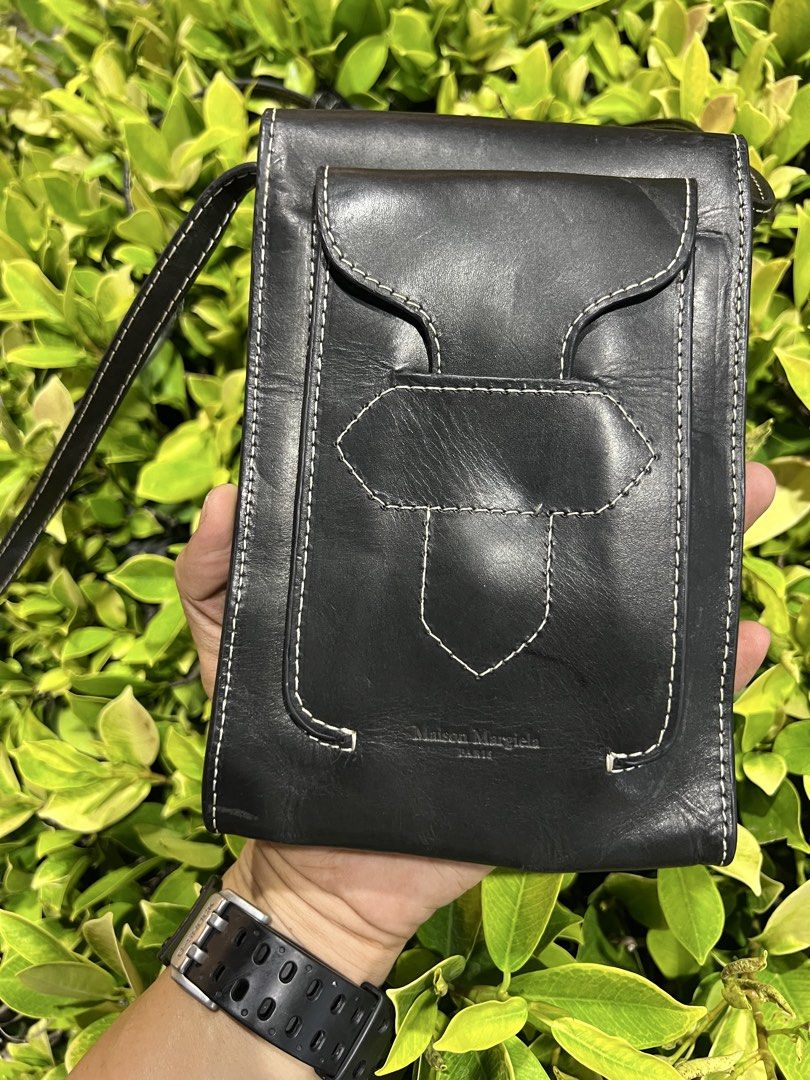 Maison Margiela (Category: Luxury Bags & Wallets) located in Bacolod City. Submitted by novymae23 (Listing ID 1436175622, Image 2). Description: Maison Margiela Leather Crossbody Bag Size Small With 2 Pocket .