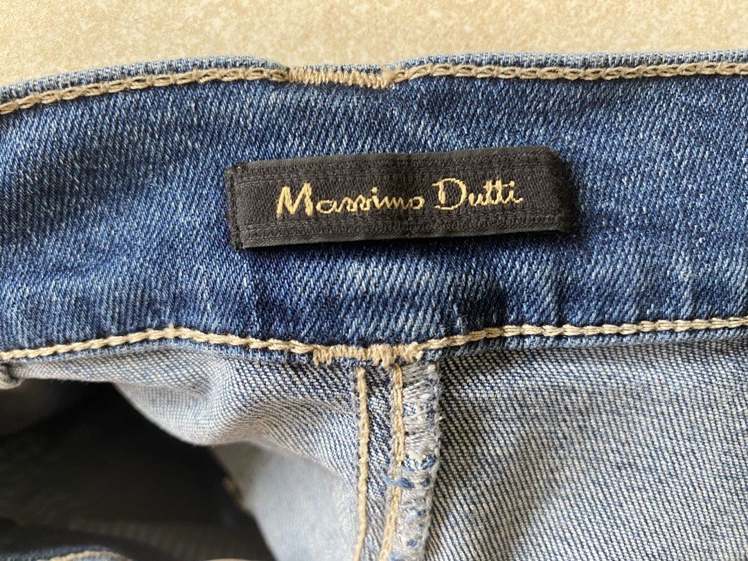 Massimo Dutti Denim Button-Down Skirt (Category: Skirts) located in Mandaluyong City. Submitted by declutteringmodenow (Listing ID 1436175403, Image 2). Description: - Massimo Dutti denim skirt - Button-down style - Classic A-line silhouette - Features two front pockets - Dark blue wash - Gold-colored buttons - Made in Turkey - Size: EUR 34, USA 2, MEX 24.