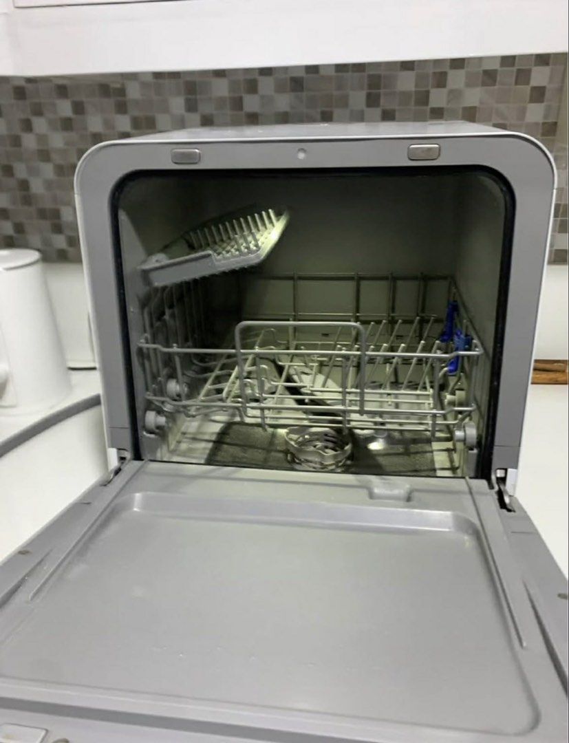 Maximus MAX-004M Mini Dishwasher (Category: Dishwasher) located in Makati City. Submitted by katrina_00 (Listing ID 1436123600, Image 3). Description: Color: White 2 place settings (European standard) 2 dinner plates, 2 soup plates, 2 dessert dishes, 2 glasses, 2 tea cups, 2 saucers, 2 forks, 2 soup spoons, 2 knives, 2 dessert spoons, 2 teaspoons, 1 oval platter, 1 medium serving bowl, 1 small serving bowl, 1 gravy ladle, 1 serving fork, 2 servin