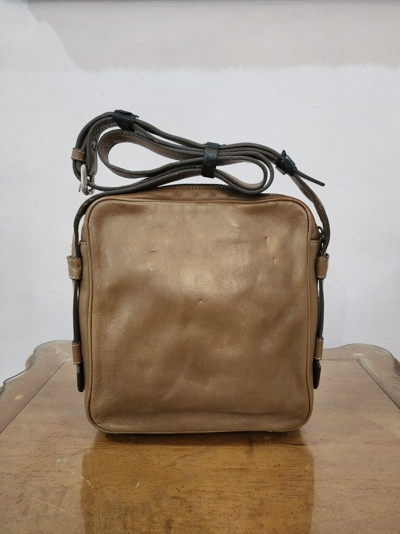 Mcm Men's Sling (Category: Luxury Bags & Wallets) located in Valenzuela. Submitted by absolutelychick (Listing ID 1324744476, Image 2). Description: L 9" x W 2.5" x H 9.75" Yung color po nito para po siyang olive green na tan. meron pong fade sa hardwares and near sa zipper konting press mark sa body please check photos for reference jrs, lbc, j&t lalamove/grab ready.