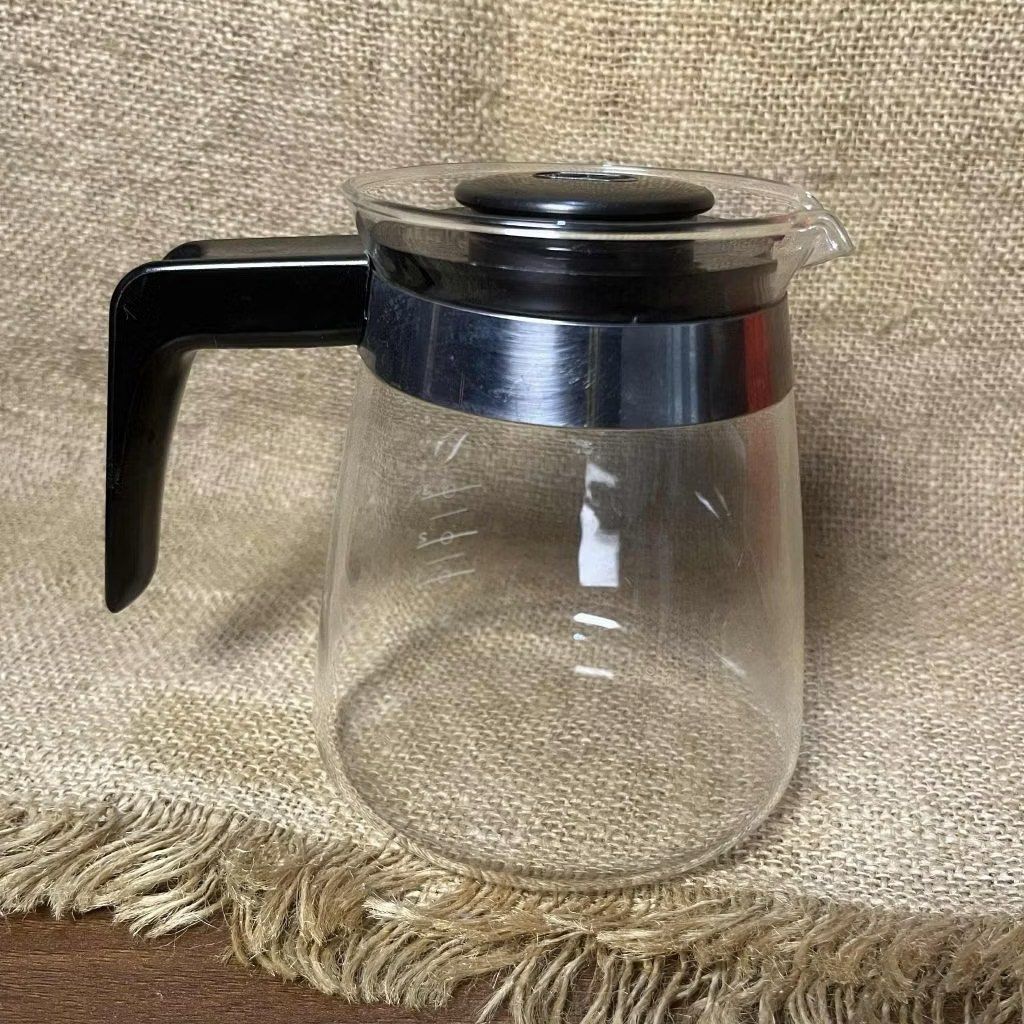 Melitta Coffee Maker Carafe (Category: Coffee Machines & Makers) located in Bulacan. Submitted by ceramicscubby (Listing ID 1436172902, Image 2). Description: Size: 3.75 D x 5.1 H in. ❗️CLOSING DOWN SALE, ALL PRICES ARE MARKED DOWN. WE WILL NOT BE ACCEPTING OFFERS LOWER THAN OUR ASKING PRICE. ❗️ - Melitta coffee maker carafe - Black handle and lid - Measurement markings on the side - Minor rust present.