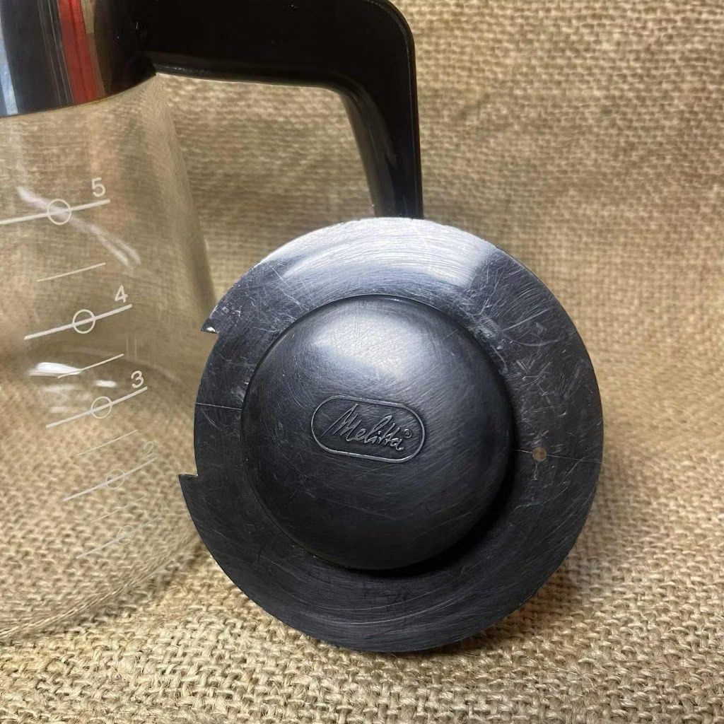 Melitta Coffee Maker Carafe (Category: Coffee Machines & Makers) located in Bulacan. Submitted by ceramicscubby (Listing ID 1436172902, Image 3). Description: Size: 3.75 D x 5.1 H in. ❗️CLOSING DOWN SALE, ALL PRICES ARE MARKED DOWN. WE WILL NOT BE ACCEPTING OFFERS LOWER THAN OUR ASKING PRICE. ❗️ - Melitta coffee maker carafe - Black handle and lid - Measurement markings on the side - Minor rust present.