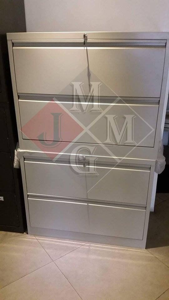 Metal Filing Cabinet with Drawers (Category: Office Furniture & Fixtures) located in Caloocan City. Submitted by brightgem-d4ebba (Listing ID 1436152168, Image 1). Description: - Metal filing cabinet - Multiple drawers for organized storage - Sturdy and functional design - Suitable for office or home - Neutral color - Includes a lock for security - Provides ample space for files and documents.