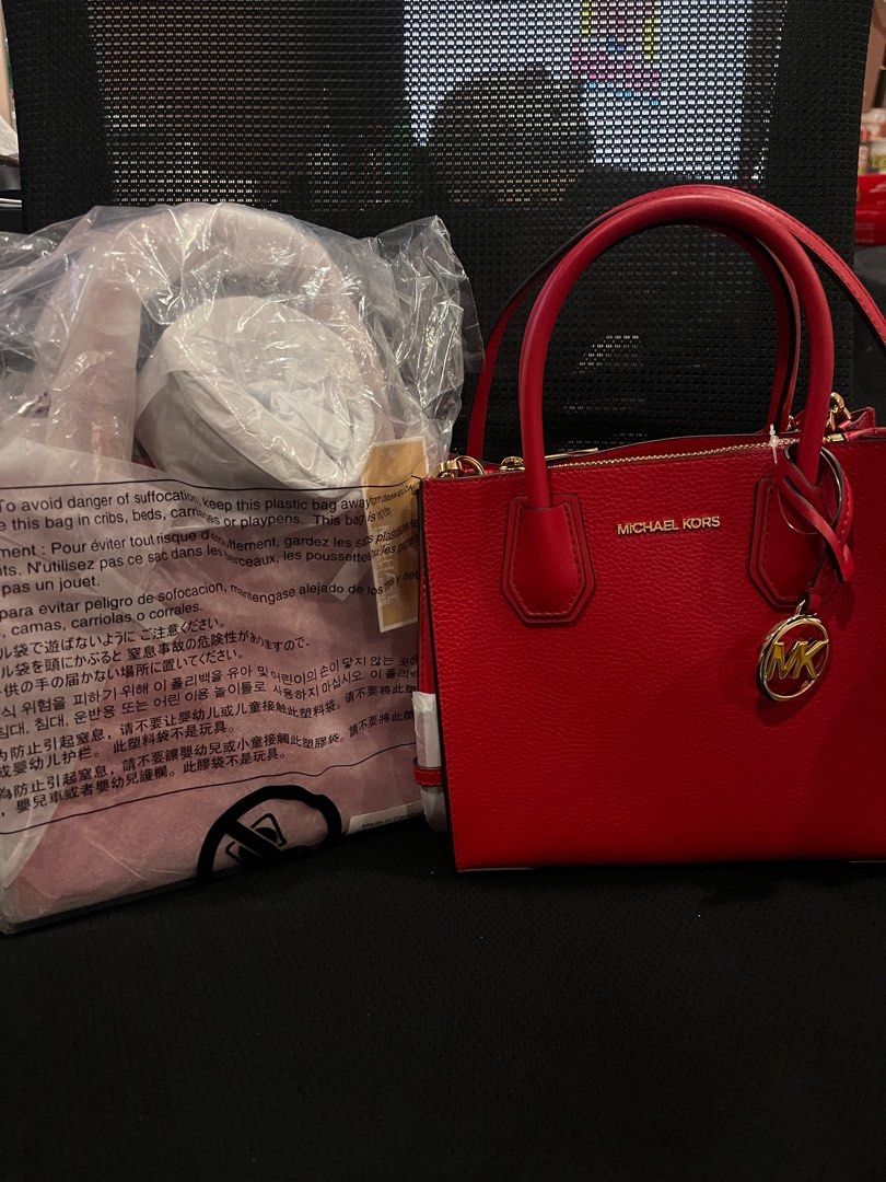 Michael Kors Red Handbag mercer (Category: Luxury Bags & Wallets) located in Manila. Submitted by luckyturtle_6b6bf4 (Listing ID 1436262163, Image 1). Description: - Authentic Michael Kors handbag - Color: Red - Features: - Top handle - Detachable shoulder strap - Gold-tone hardware - Gold logo charm - Material: Textured leather - Condition: Excellent -.