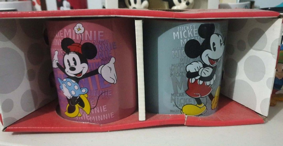 Mickey and Minnie Mouse mugs (Category: Coffee & Tea Tableware) located in Manila. Submitted by shanmayeng (Listing ID 1436126425, Image 1). Description: - Mickey and Minnie Mouse mug set - Features iconic Disney characters - Includes two mugs, one with Minnie and one with Mickey - Ideal for personal use or as a gift - ORIGINAL!!! -MADE IN THE USA.