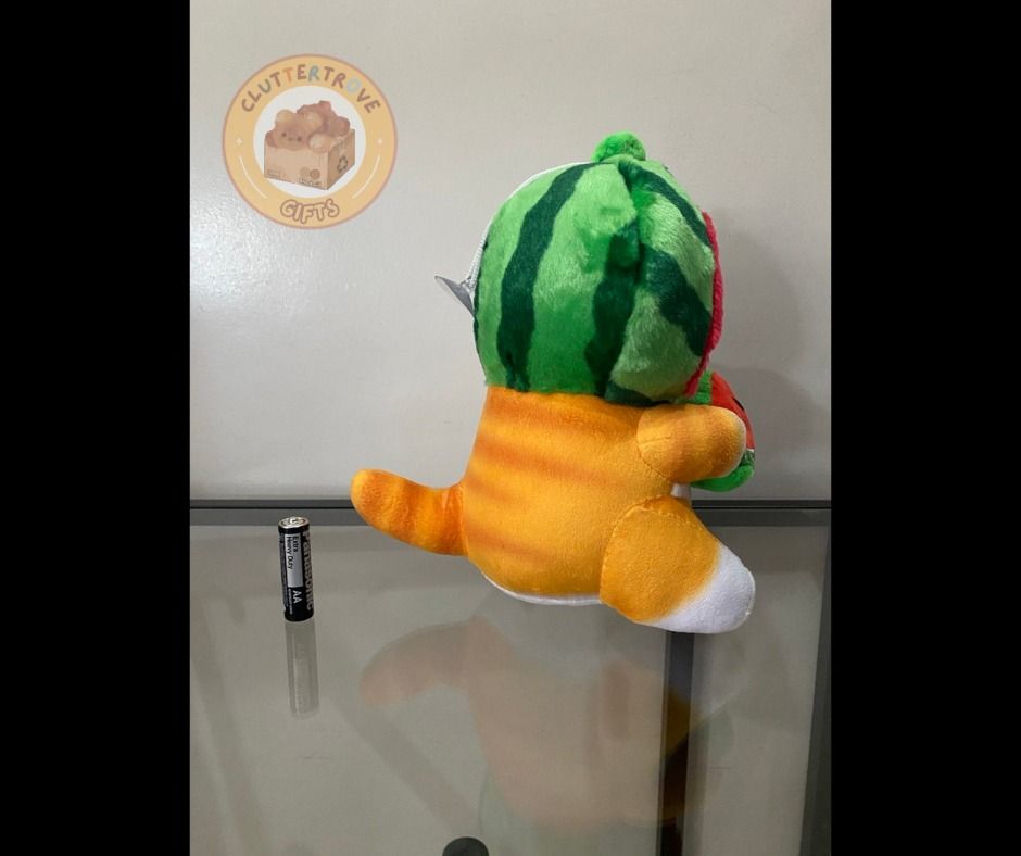 Mofusand Orange Watermelon Cat [Unofficial] (Category: Plushies & Soft Toys) located in Mabalacat. Submitted by cluttertrove (Listing ID 1436275622, Image 2). Description: ⊹₊⟡⋆ 𝐏𝐫𝐢𝐜𝐞: 𝐏𝐇𝐏 𝟏𝟓𝟎 ⊹₊⟡⋆ ⤷ Condition: Like-new ⤷ Details: - Can be suctioned to display in your car - Approximately 8.5 inches For any questions, please send a message~ (˶◜ᵕ◝˶).
