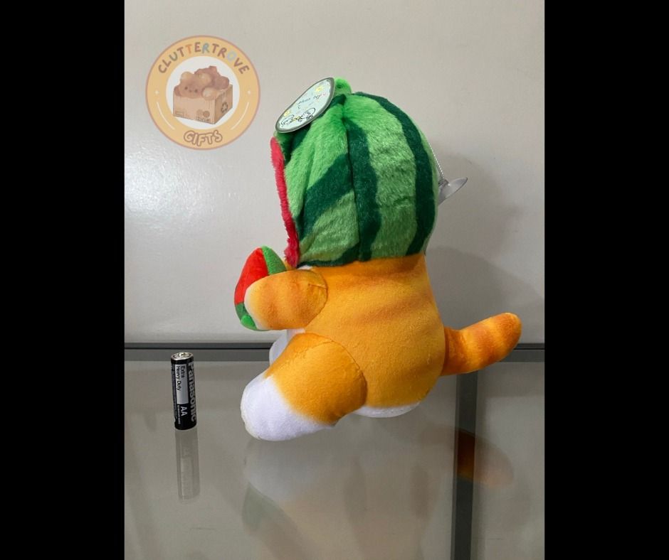 Mofusand Orange Watermelon Cat [Unofficial] (Category: Plushies & Soft Toys) located in Mabalacat. Submitted by cluttertrove (Listing ID 1436275622, Image 3). Description: ⊹₊⟡⋆ 𝐏𝐫𝐢𝐜𝐞: 𝐏𝐇𝐏 𝟏𝟓𝟎 ⊹₊⟡⋆ ⤷ Condition: Like-new ⤷ Details: - Can be suctioned to display in your car - Approximately 8.5 inches For any questions, please send a message~ (˶◜ᵕ◝˶).