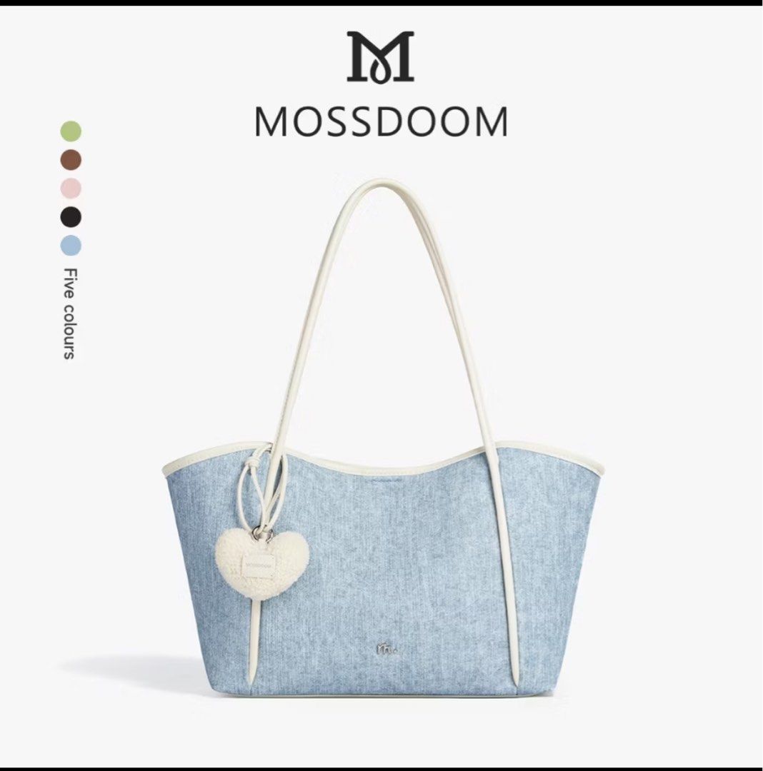 Mossdoom bag (Category: Tote Bags) located in Manila. Submitted by emsmerize (Listing ID 1436190389, Image 1). Description: User twice Complete with bag charm and dust bag Rfs: mag back pack para commute friendly.