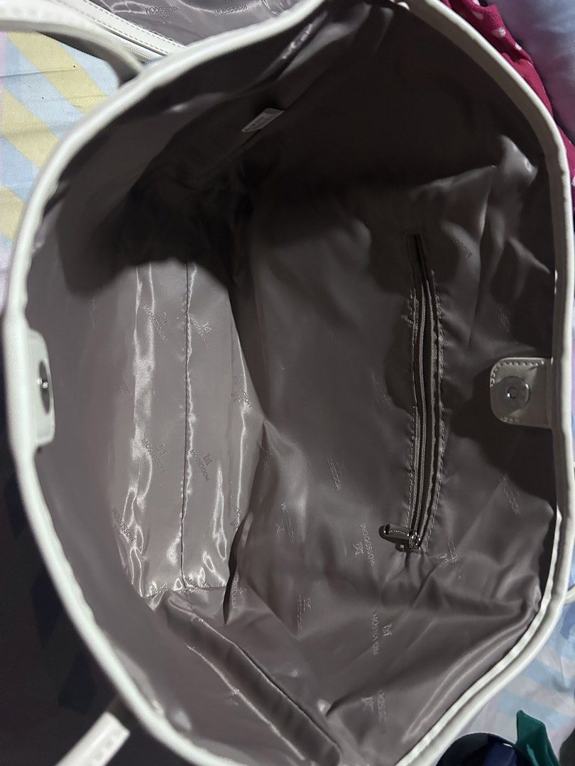 Mossdoom bag (Category: Tote Bags) located in Manila. Submitted by emsmerize (Listing ID 1436190389, Image 3). Description: User twice Complete with bag charm and dust bag Rfs: mag back pack para commute friendly.