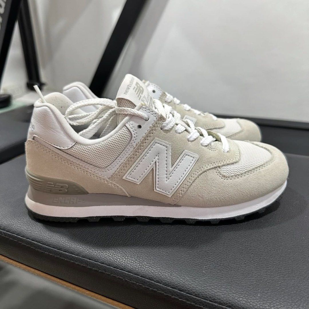 New Balance 574 Classic Sneakers (Category: Sneakers) located in Antipolo. Submitted by nikki.sells (Listing ID 1436103775, Image 1). Description: - New Balance 574 - Neutral colorway - Suede and mesh upper - Iconic 'N' logo - Cushioned midsole for comfort - Black soles - White laces - New Balance branding on heel - Used once (mall walking) - True to size - Size: US W 8; US M 6.5; EU 39; 25cm - No box￼.