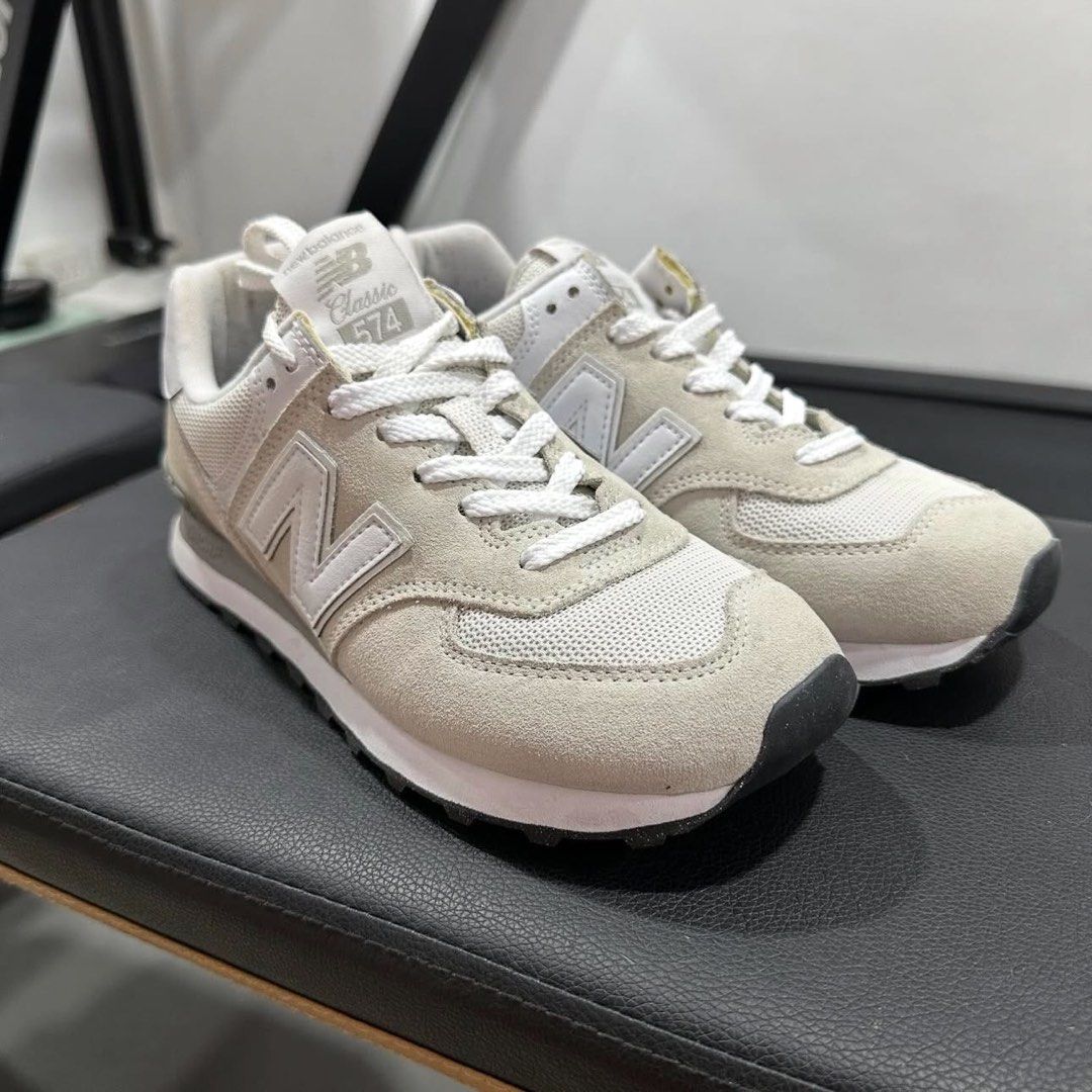New Balance 574 Classic Sneakers (Category: Sneakers) located in Antipolo. Submitted by nikki.sells (Listing ID 1436103775, Image 2). Description: - New Balance 574 - Neutral colorway - Suede and mesh upper - Iconic 'N' logo - Cushioned midsole for comfort - Black soles - White laces - New Balance branding on heel - Used once (mall walking) - True to size - Size: US W 8; US M 6.5; EU 39; 25cm - No box￼.