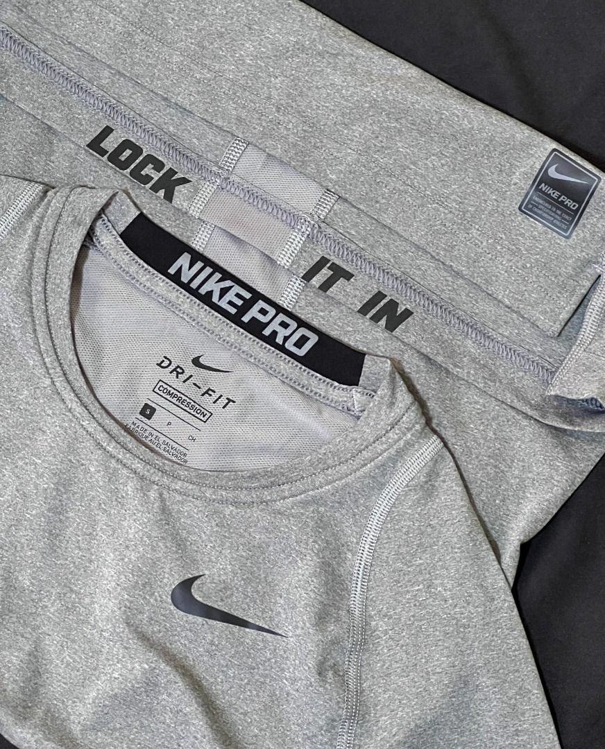 Nike Pro Dri-fit Compression Shirt - Gray (Category: Tshirts & Polo Shirts ) located in Taguig. Submitted by LessThan (Listing ID 1436234053, Image 3). Description: Nike Pro Dri-fit Compression Shirt Color Gray Size when not expanded: Body (15" x 25-26" inches), Sleeves (5" x 5"-6" inches) - White Nike logo on the front - Nike Pro logo on collar - breathable ribbed panel/mesh-type fabric on back - Made with performance fabric - Perfect for traini